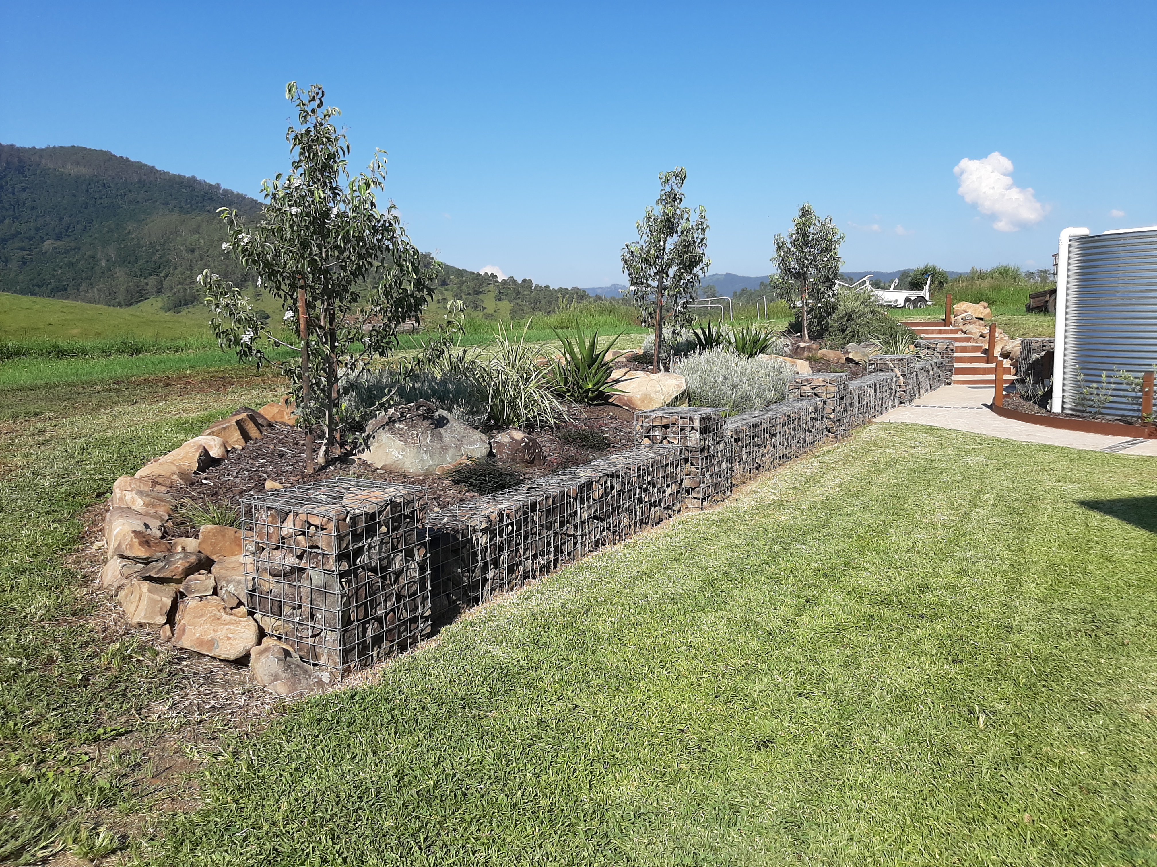 rock wall garden and turfing